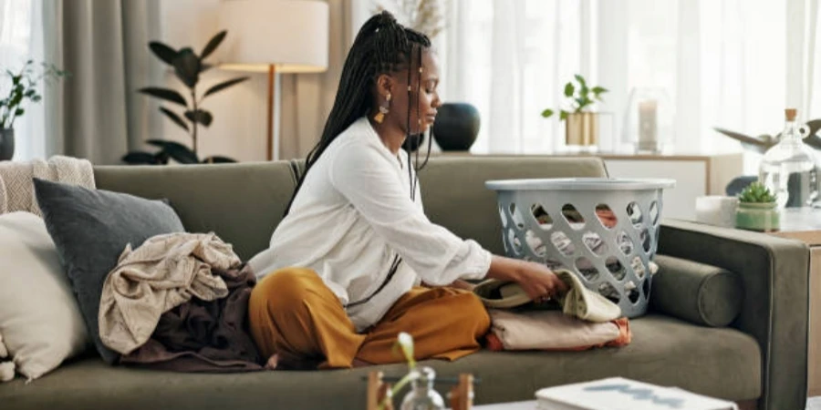 Woman Doing Laundry at Home