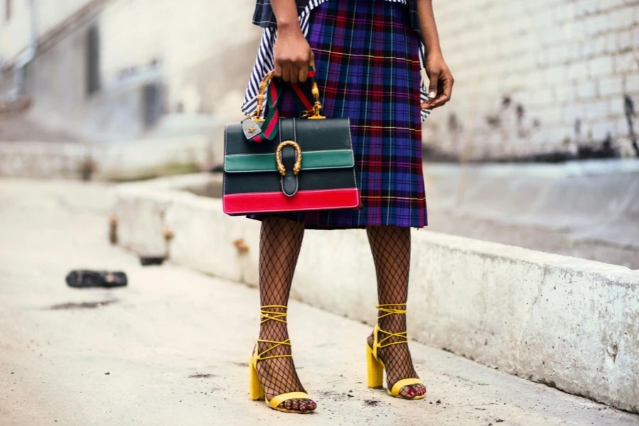 Woman Holding Leather Handbag