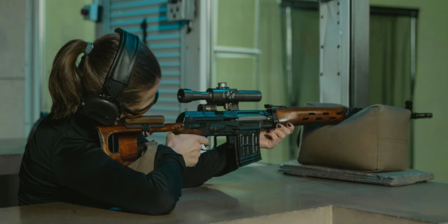 Woman Shooting a Rifle