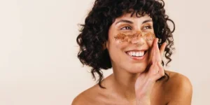 Woman Treating Her Face with Coffee Scrub