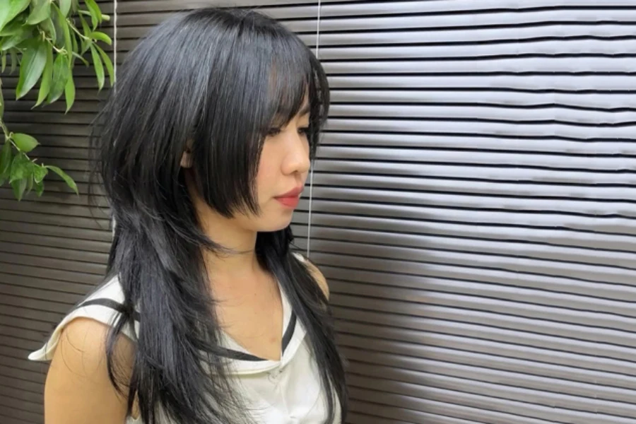 Young Japanese woman with modern hime cut hairstyle