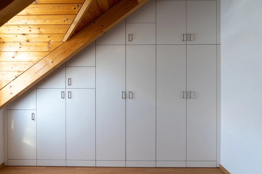 a built-in closet under the stairs