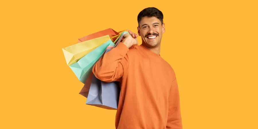 a funny millennial guy with a moustache smiling