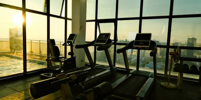 a gym with a view of the city