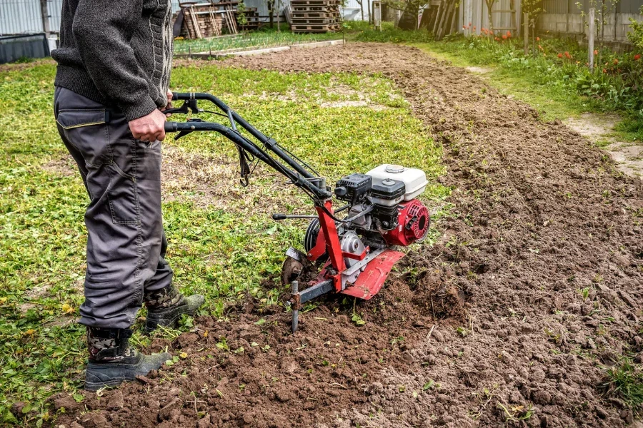 farmer man plows the land