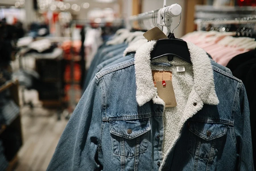 Sherpa-lined denim jackets in a clothing store