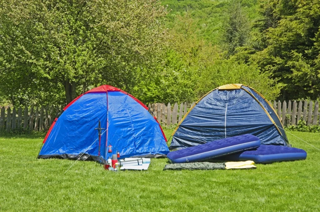 two tents with camping air mattress