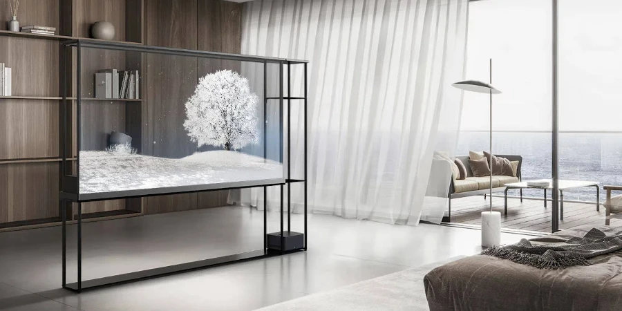 A modern living room with a transparent TV on a stand.