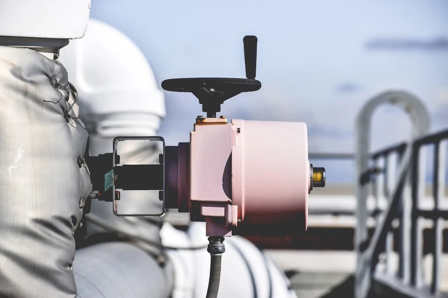 A valve and actuator on some cooling equipment on the roof