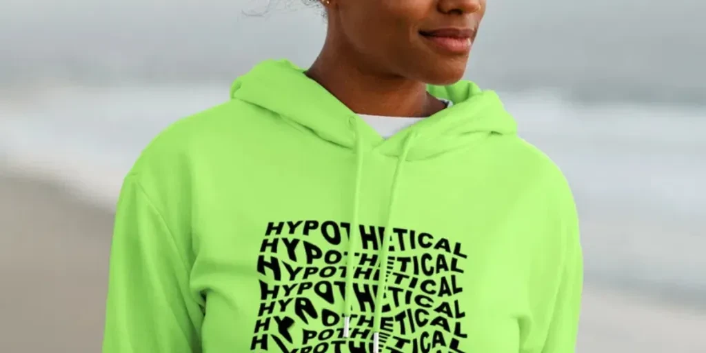 Beautiful woman wearing neon green hoodie, streetwear apparel with text hypothetical