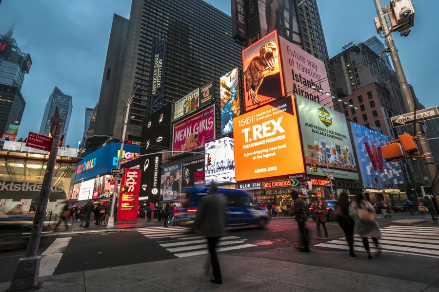 Broadway with multiple billboard advertisements