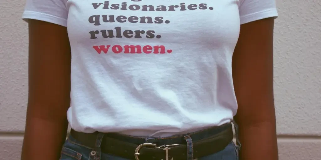 Close-up of a t-shirt celebrating womens roles and empowerment