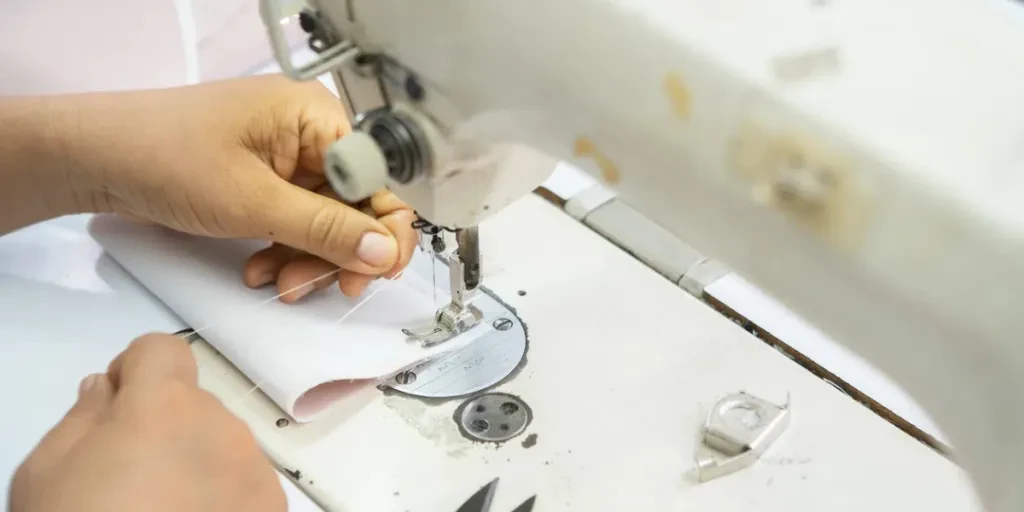 Close up view of sewing process