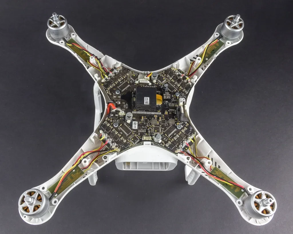 DJI Phantom 4 internal structure showing integrated circuit board and components.