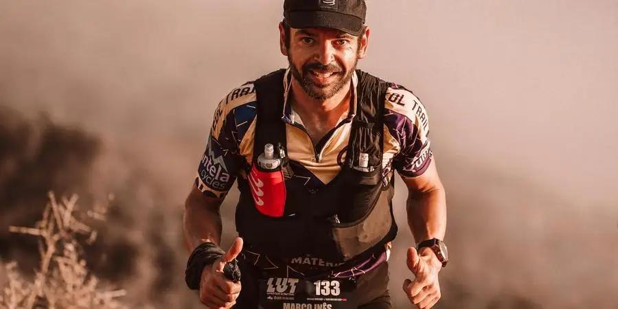 Determined trail runner participating in a race, showing perseverance and athleticism by RUN 4 FFWPU