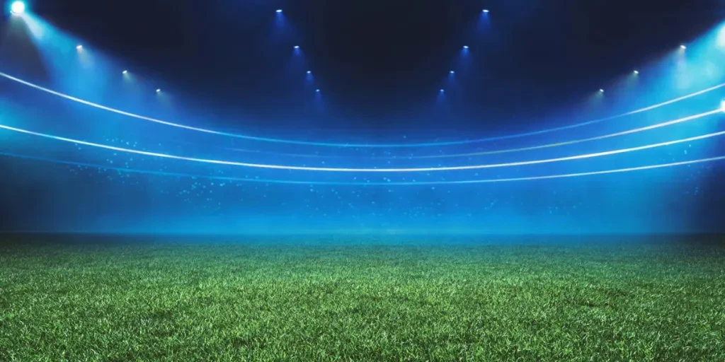 Digital Football stadium view illuminated by blue spotlights and empty green grass field