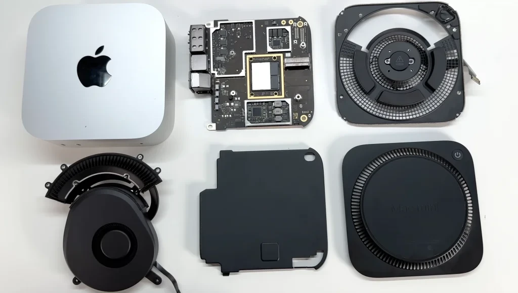 Disassembled components of a Mac mini.