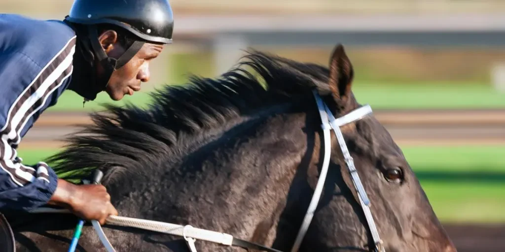 Dynamic shot of a jockey racing a horse at full speed, showcasing action and speed