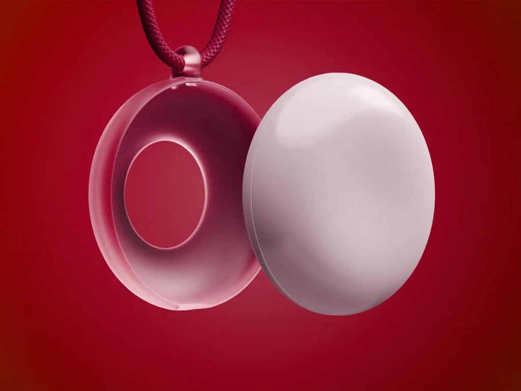 Friend AI Hardware device resembling a Go stoneFriend AI Hardware device resembling a Go stone.
