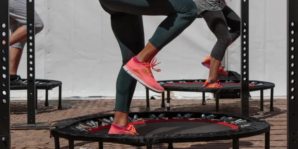 Girl doing Fitness Exercise in Class at Outdoor Gym