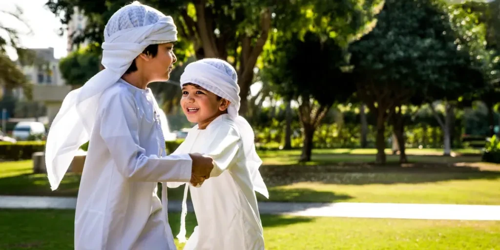 Group of middle-eastern kids wearing white kandora playing in a park in Dubai