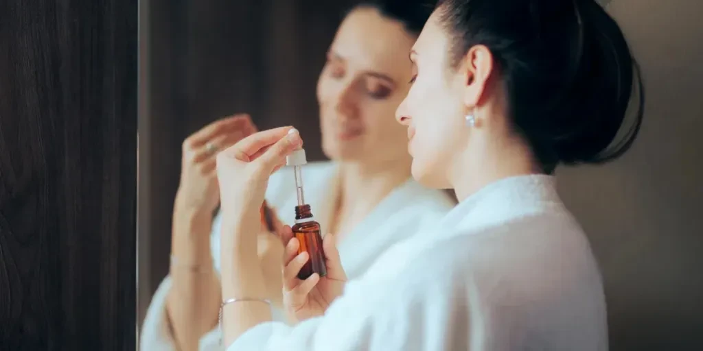 Lady in her 30s doing her skin care routing every night