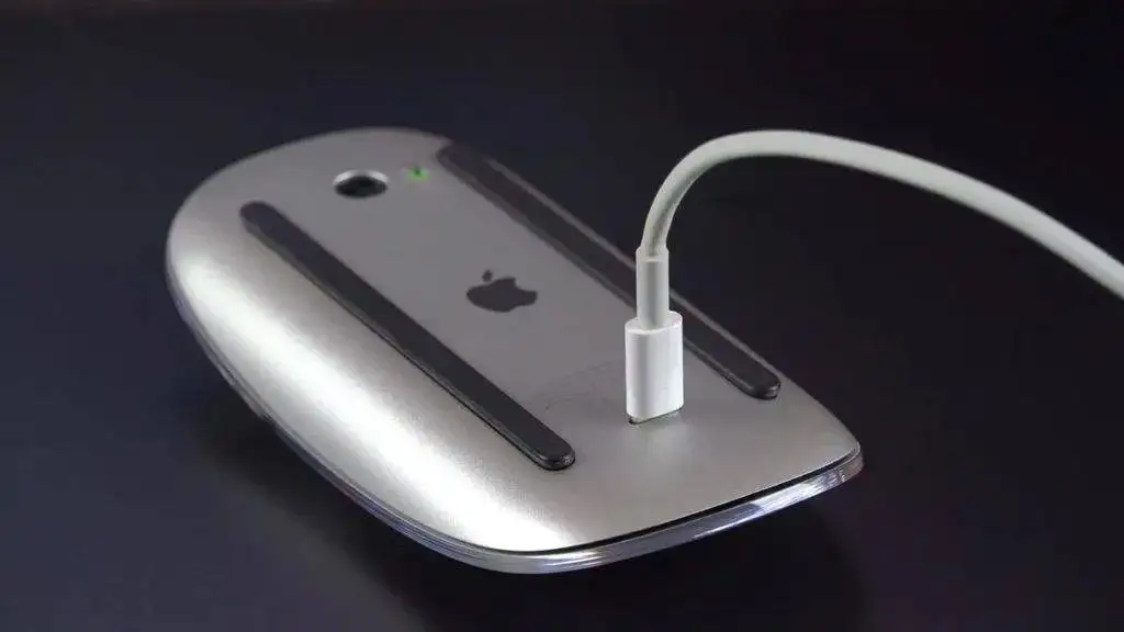 Magic Mouse flipped upside down showing the charging port