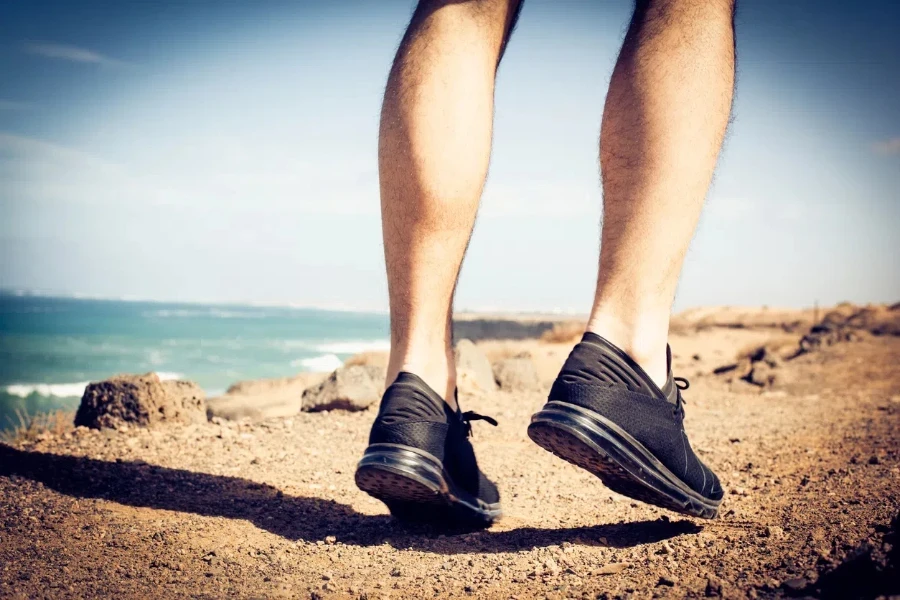 Man running. Close up image of his legs