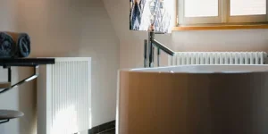 Modern heater near a window