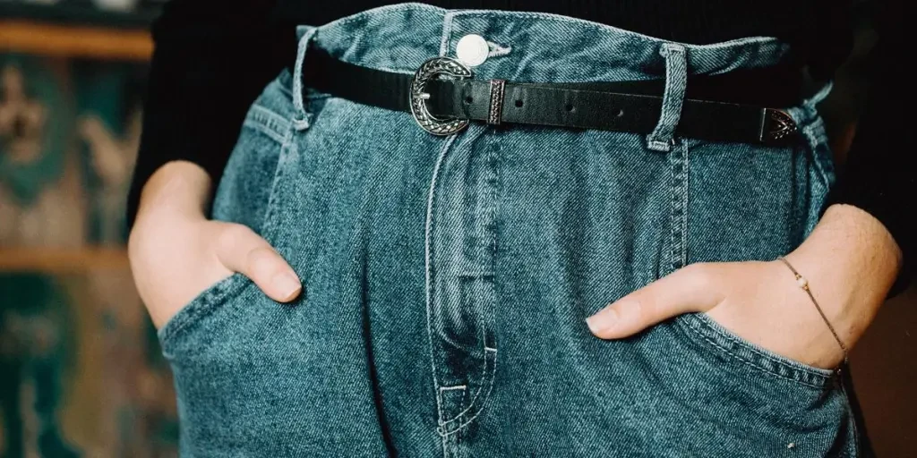 Person Holding Their Hands In Jean Pockets