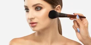 Portrait of a beautiful brunette girl with beautiful fresh makeup and healthy clean skin