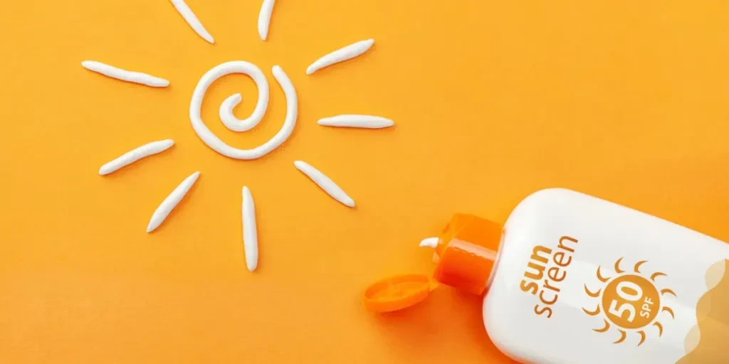 Sunscreen on orange background