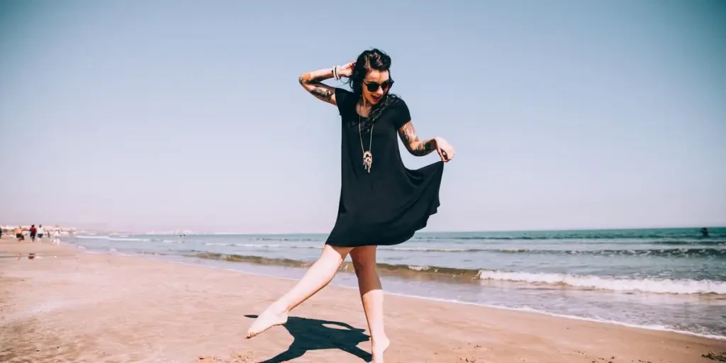 Woman Dances On The Sand