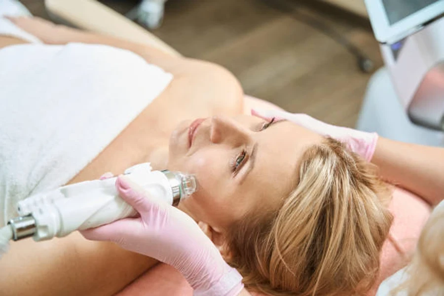 Woman receiving radiofrequency microneedling treatment to reduce wrinkles