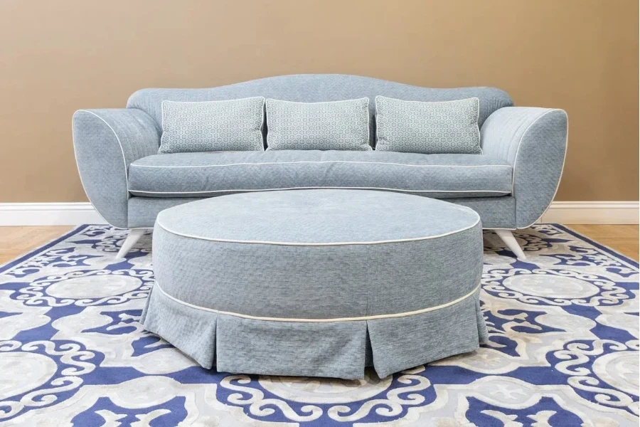 A gray sofa and center table made with polyester upholstery