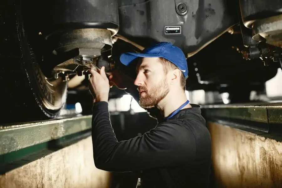 A man repairing a car