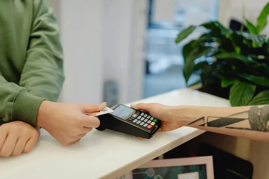 A person holding a bank card