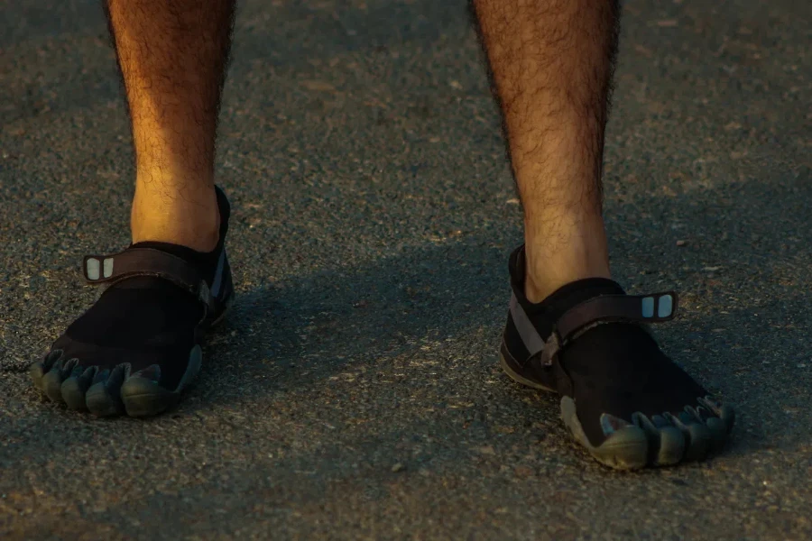 barefoot marathon runner warming up before his startup