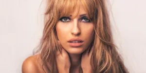 blonde woman with wispy bangs