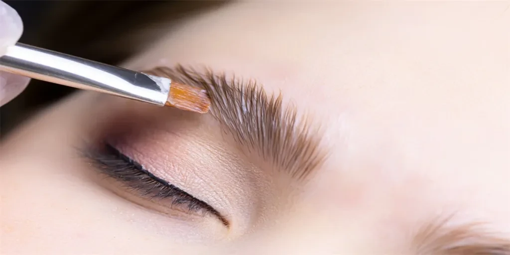 close-up of the procedure for long-term eyebrow styling