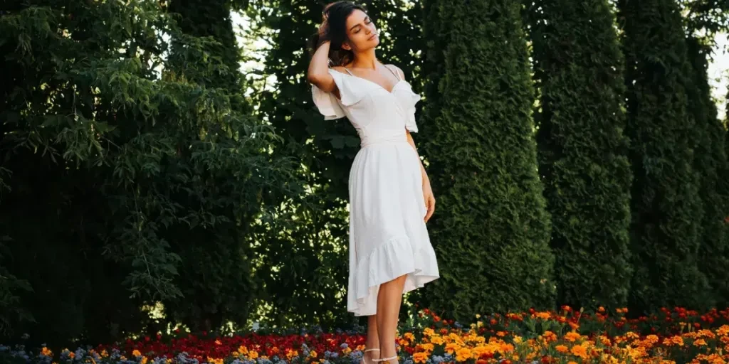 elegant young brunette woman posing with closed eyes