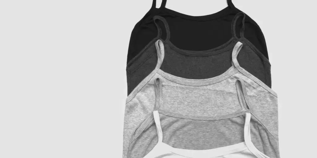 grayscale photos of five camisoles