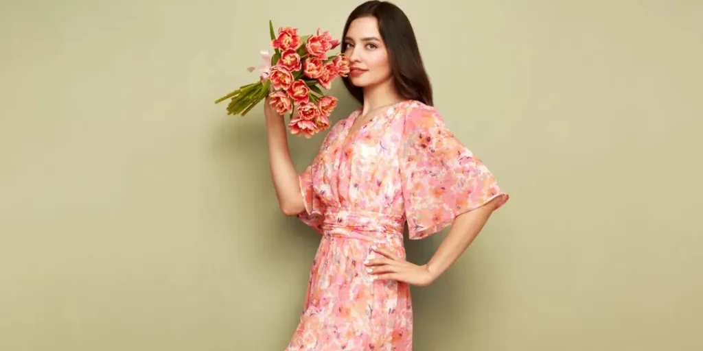 happy beauty woman with pink tulip bouquet