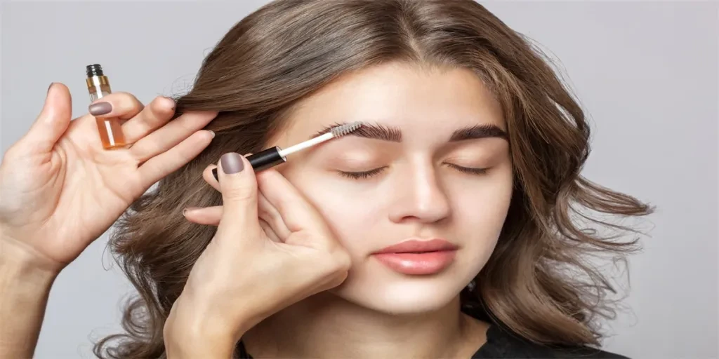 ortrait of a beautiful happy woman thick eyebrows and with clean skin in a beauty salon