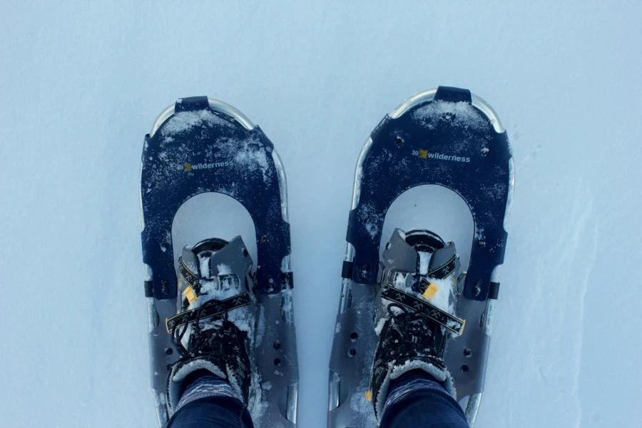 person wearing black and white snow goggles