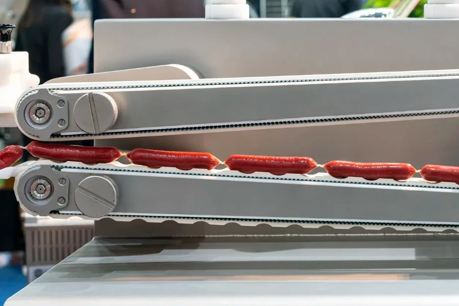 sausage chain during produced by past on conveyor system of automatic machine