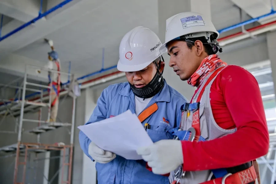 Two men in safety gear