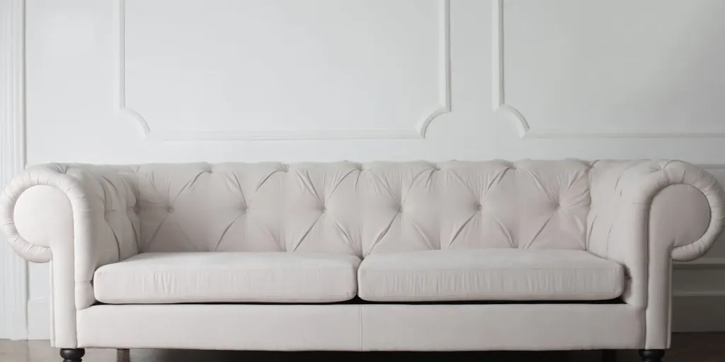 White upholstered sofa in a living room