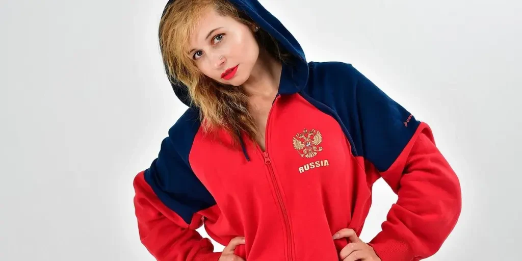 young woman, beauty, woman, football fan, cheerleader, groupie, hoodie, hoody