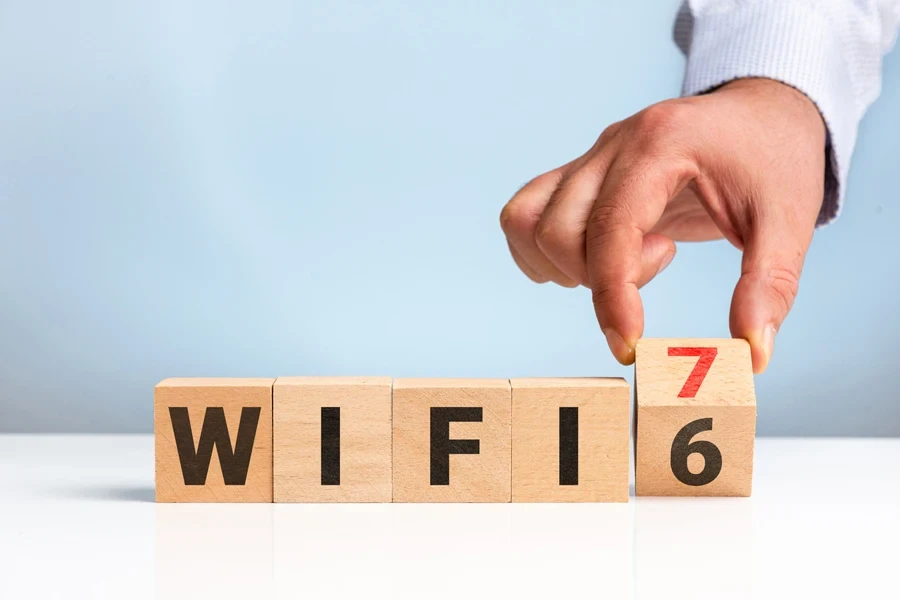 A hand changing Wi-Fi 6 to 7